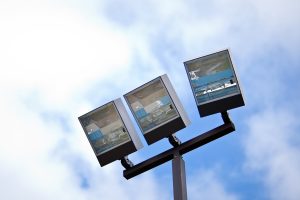 commercial outdor lighting on a pole in a parking lot